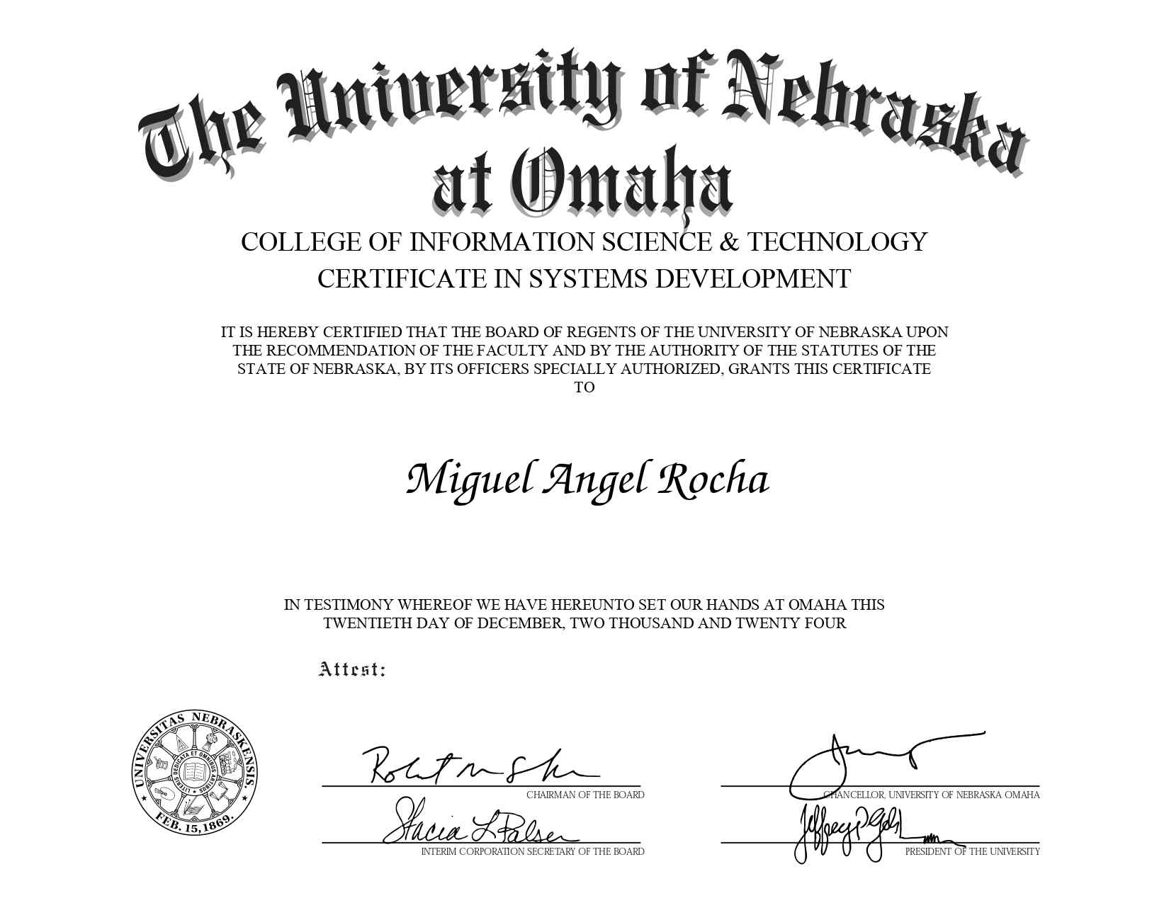  Certificate from the University of Nebraska at Omaha, College of Information Science & Technology, awarded to Miguel Angel Rocha for completing the Certificate in Systems Development. The document features the university's name in bold, stylized lettering at the top, followed by formal text certifying the achievement. The university seal, dated February 15, 1869, is positioned on the lower left, with signatures from university officials, including the Chairman of the Board, Chancellor, and President of the University, at the bottom. The certificate is dated December 20, 2024.