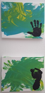 One canvas with Michael's hand print and the second canvas with Michael's foot print