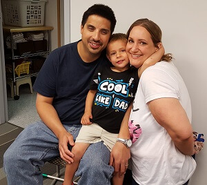 Family picture at my graduation from the blind center. The picture has my wife Kimberly, my son Michael and me.