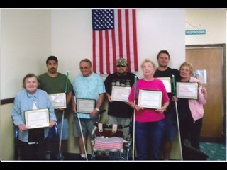 Picture of All Students Holding certificates of completion.